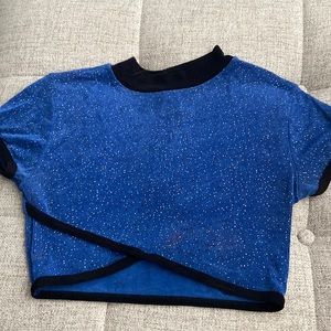 Blue sparkle with black trim crop top.